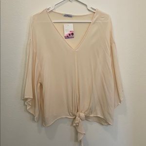 NWT danity hooligan tie top flowy cream size small
